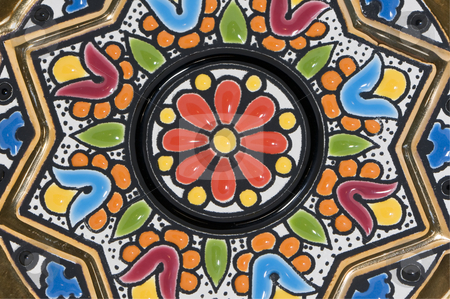 To use this stock image in your creative project, please select the size you need over to the right and click the "Add to Cart" button.
Your downloaded image will come with the Cutcaster watermark removed so don’t worry about the watermark you see on this page. Pattern stock photo, Coloured decoration on a pottery plate by Massimiliano Leban