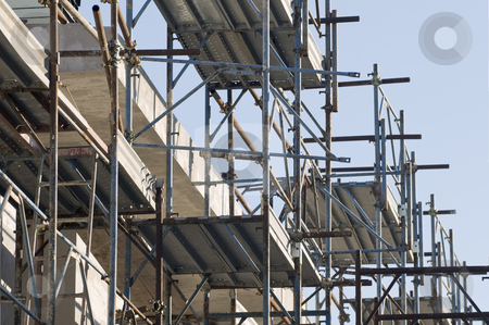 To use this stock image in your creative project, please select the size you need over to the right and click the "Add to Cart" button.
Your downloaded image will come with the Cutcaster watermark removed so don’t worry about the watermark you see on this page. Scaffolding stock photo, Detail of scaffolding in a construction site by Massimiliano Leban
