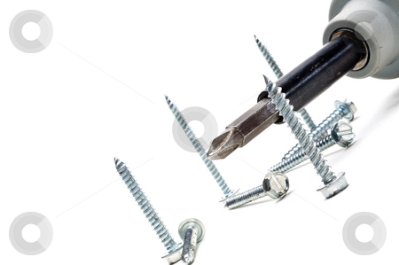 To use this stock image in your creative project, please select the size you need over to the right and click the "Add to Cart" button.
Your downloaded image will come with the Cutcaster watermark removed so don’t worry about the watermark you see on this page. Tilted view of screws and a power screwdriver on white stock photo, Tilted view of screws and a power screwdriver on white by Vince Clements