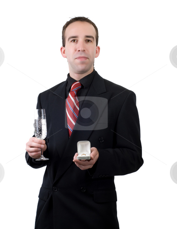 To use this stock image in your creative project, please select the size you need over to the right and click the "Add to Cart" button.
Your downloaded image will come with the Cutcaster watermark removed so don’t worry about the watermark you see on this page. Showing Off Ring stock photo, A young man showing the ring he plans to propose with, isolated against a white background by Richard Nelson