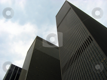 To use this stock image in your creative project, please select the size you need over to the right and click the "Add to Cart" button.
Your downloaded image will come with the Cutcaster watermark removed so don’t worry about the watermark you see on this page. Corporate architecture stock photo, An example of modern corporate architecture found in the city. by Todd Arena