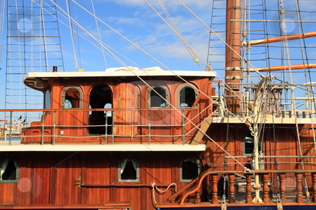 To use this stock image in your creative project, please select the size you need over to the right and click the "Add to Cart" button.
Your downloaded image will come with the Cutcaster watermark removed so don’t worry about the watermark you see on this page. Wooden sail Boat stock photo, Wooden sail boat moored to docks on the Savannah river by Jack Schiffer