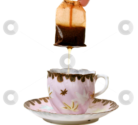 To use this stock image in your creative project, please select the size you need over to the right and click the "Add to Cart" button.
Your downloaded image will come with the Cutcaster watermark removed so don’t worry about the watermark you see on this page. Dripping Tea Bag stock photo, Dripping tea bag in an antique tea cup. by Brett Mulcahy