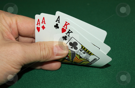 To use this stock image in your creative project, please select the size you need over to the right and click the "Add to Cart" button.
Your downloaded image will come with the Cutcaster watermark removed so don’t worry about the watermark you see on this page. Aces and kings stock photo, Showing a great hand with aces and kings by Tim Markley