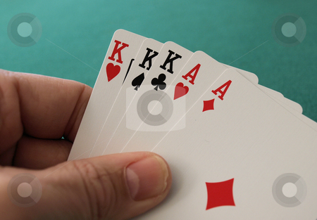 To use this stock image in your creative project, please select the size you need over to the right and click the "Add to Cart" button.
Your downloaded image will come with the Cutcaster watermark removed so don’t worry about the watermark you see on this page. Full house stock photo, Full house hand with ace and kings by Tim Markley