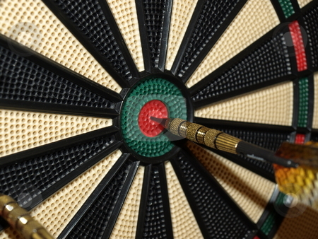 To use this stock image in your creative project, please select the size you need over to the right and click the "Add to Cart" button.
Your downloaded image will come with the Cutcaster watermark removed so don’t worry about the watermark you see on this page. Dead center stock photo, A dart thrown at dead center of the board by Tim Markley