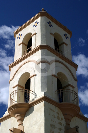 To use this stock image in your creative project, please select the size you need over to the right and click the "Add to Cart" button.
Your downloaded image will come with the Cutcaster watermark removed so don’t worry about the watermark you see on this page. Ojai Tower stock photo, The Ojai post office tower with a nice blue sky and clouds by Henrik Lehnerer