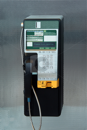 To use this stock image in your creative project, please select the size you need over to the right and click the "Add to Cart" button.
Your downloaded image will come with the Cutcaster watermark removed so don’t worry about the watermark you see on this page. Payphone stock photo, A modern payphone on a silver background by Kevin Tietz