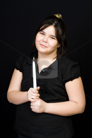 To use this stock image in your creative project, please select the size you need over to the right and click the "Add to Cart" button.
Your downloaded image will come with the Cutcaster watermark removed so don’t worry about the watermark you see on this page. Innocent Girl stock photo, A young innocent girl holding a white candle, shot against a dark background by Richard Nelson