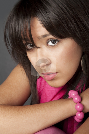 To use this stock image in your creative project, please select the size you need over to the right and click the "Add to Cart" button.
Your downloaded image will come with the Cutcaster watermark removed so don’t worry about the watermark you see on this page. Pretty Young Woman stock photo, Closeup of pretty young mixed race woman by Scott Griessel