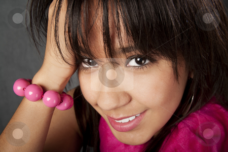 To use this stock image in your creative project, please select the size you need over to the right and click the "Add to Cart" button.
Your downloaded image will come with the Cutcaster watermark removed so don’t worry about the watermark you see on this page. Pretty Young Woman stock photo, Closeup of pretty young mixed race woman by Scott Griessel