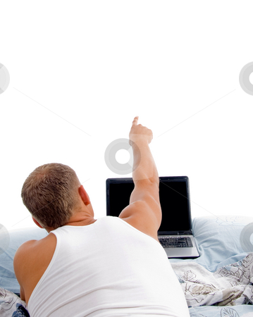 To use this stock image in your creative project, please select the size you need over to the right and click the "Add to Cart" button.
Your downloaded image will come with the Cutcaster watermark removed so don’t worry about the watermark you see on this page. Man with laptop on white background stock photo, Laying indicating man with laptop on an isolated white background by Imagery Majestic
