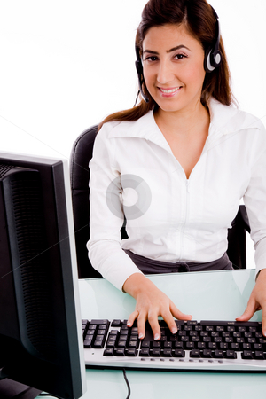 To use this stock image in your creative project, please select the size you need over to the right and click the "Add to Cart" button.
Your downloaded image will come with the Cutcaster watermark removed so don’t worry about the watermark you see on this page. Front view of young telecaller in office stock photo, Front view of young telecaller in office with white background by Imagery Majestic