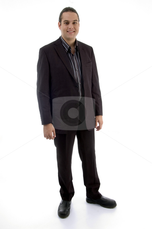 To use this stock image in your creative project, please select the size you need over to the right and click the "Add to Cart" button.
Your downloaded image will come with the Cutcaster watermark removed so don’t worry about the watermark you see on this page. Standing adult businessman stock photo, Standing adult businessman on an isolated white background by Imagery Majestic