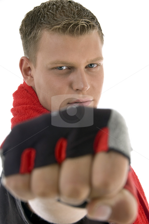 To use this stock image in your creative project, please select the size you need over to the right and click the "Add to Cart" button.
Your downloaded image will come with the Cutcaster watermark removed so don’t worry about the watermark you see on this page. Man showing punch stock photo, Man showing punch against white background by Imagery Majestic