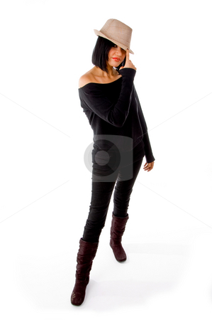 To use this stock image in your creative project, please select the size you need over to the right and click the "Add to Cart" button.
Your downloaded image will come with the Cutcaster watermark removed so don’t worry about the watermark you see on this page. Front view of standing model wearing hat stock photo, Front view of standing model wearing hat on an isolated background by Imagery Majestic
