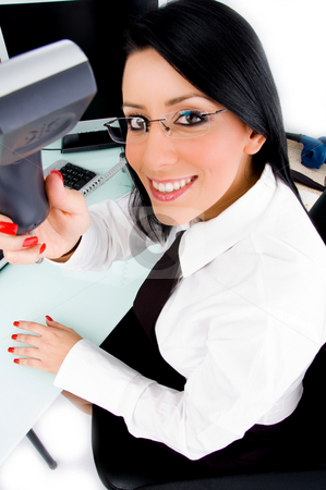 To use this stock image in your creative project, please select the size you need over to the right and click the "Add to Cart" button.
Your downloaded image will come with the Cutcaster watermark removed so don’t worry about the watermark you see on this page. Executive showing phone receiver stock photo, Executive showing phone receiver with white background by Imagery Majestic