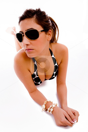 To use this stock image in your creative project, please select the size you need over to the right and click the "Add to Cart" button.
Your downloaded image will come with the Cutcaster watermark removed so don’t worry about the watermark you see on this page. Front view of sensuous woman wearing sunglasses stock photo, Front view of sensuous woman wearing sunglasses on an isolated background by Imagery Majestic