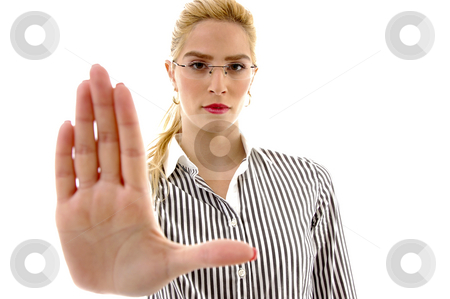 To use this stock image in your creative project, please select the size you need over to the right and click the "Add to Cart" button.
Your downloaded image will come with the Cutcaster watermark removed so don’t worry about the watermark you see on this page. Front view of female asking to stop stock photo, Front view of female asking to stop on an isolated white background by Imagery Majestic