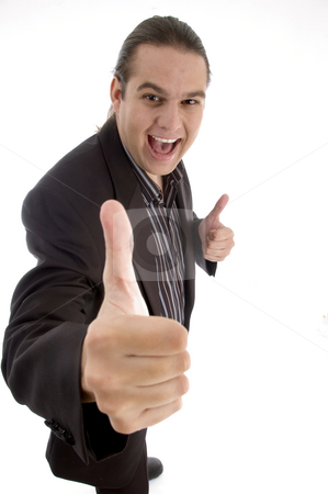 To use this stock image in your creative project, please select the size you need over to the right and click the "Add to Cart" button.
Your downloaded image will come with the Cutcaster watermark removed so don’t worry about the watermark you see on this page. Happy businessman wishing goodluck stock photo, Happy businessman wishing goodluck against white background by Imagery Majestic