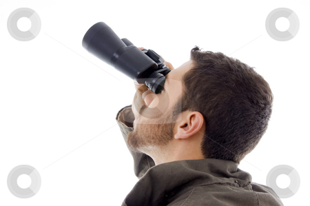 To use this stock image in your creative project, please select the size you need over to the right and click the "Add to Cart" button.
Your downloaded image will come with the Cutcaster watermark removed so don’t worry about the watermark you see on this page. Side view of hispanic man looking through binoculars stock photo, Side view of hispanic man looking through binoculars on an isolated white background by Imagery Majestic