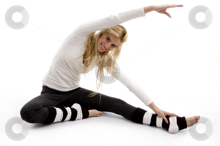 To use this stock image in your creative project, please select the size you need over to the right and click the "Add to Cart" button.
Your downloaded image will come with the Cutcaster watermark removed so don’t worry about the watermark you see on this page. Front view of woman stretching stock photo, Front view of woman stretching on an isolated white background by Imagery Majestic