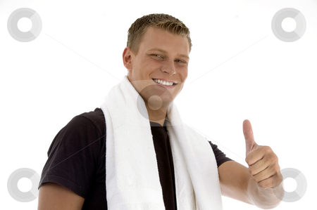 To use this stock image in your creative project, please select the size you need over to the right and click the "Add to Cart" button.
Your downloaded image will come with the Cutcaster watermark removed so don’t worry about the watermark you see on this page. Smiling man showing thumb gesture stock photo, Smiling man showing thumb gesture on an isolated background by Imagery Majestic