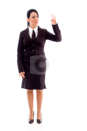 To use this stock image in your creative project, please select the size you need over to the right and click the "Add to Cart" button.
Your downloaded image will come with the Cutcaster watermark removed so don’t worry about the watermark you see on this page. Standing lawyer showing counting hand gesture stock photo, Standing lawyer showing counting hand gesture on an isolated white background by Imagery Majestic