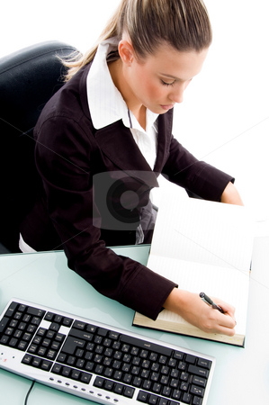 To use this stock image in your creative project, please select the size you need over to the right and click the "Add to Cart" button.
Your downloaded image will come with the Cutcaster watermark removed so don’t worry about the watermark you see on this page. Professional woman maintaining diary stock photo, Professional woman maintaining diary against white background by Imagery Majestic