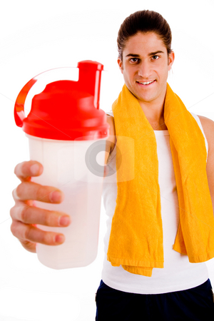 To use this stock image in your creative project, please select the size you need over to the right and click the "Add to Cart" button.
Your downloaded image will come with the Cutcaster watermark removed so don’t worry about the watermark you see on this page. Front view of young man offering energy drink stock photo, Front view of young man offering drink against white background by Imagery Majestic