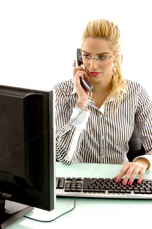 To use this stock image in your creative project, please select the size you need over to the right and click the "Add to Cart" button.
Your downloaded image will come with the Cutcaster watermark removed so don’t worry about the watermark you see on this page. Front view of woman talking on phone stock photo, Front view of woman talking on phone in an office by Imagery Majestic