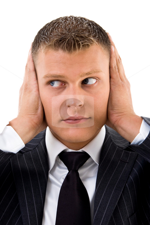 To use this stock image in your creative project, please select the size you need over to the right and click the "Add to Cart" button.
Your downloaded image will come with the Cutcaster watermark removed so don’t worry about the watermark you see on this page. Man trying to stop loud noise with his hands stock photo, Man trying to stop loud noise with his hands against white background by Imagery Majestic