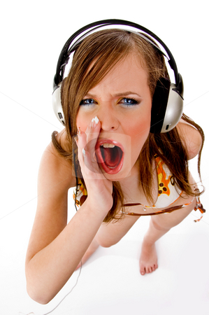 To use this stock image in your creative project, please select the size you need over to the right and click the "Add to Cart" button.
Your downloaded image will come with the Cutcaster watermark removed so don’t worry about the watermark you see on this page. Top view of shouting female enjoying music stock photo, Top view of shouting female enjoying music with white background by Imagery Majestic