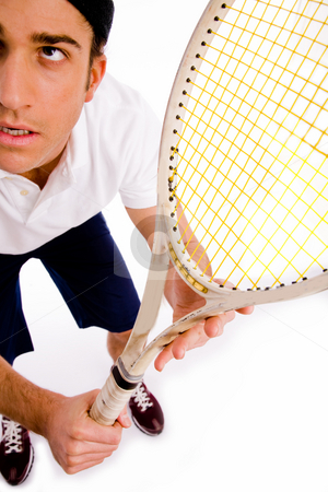 To use this stock image in your creative project, please select the size you need over to the right and click the "Add to Cart" button.
Your downloaded image will come with the Cutcaster watermark removed so don’t worry about the watermark you see on this page. Top view of tennis player with racket stock photo, Top view of tennis player with racket on an isolated white background by Imagery Majestic