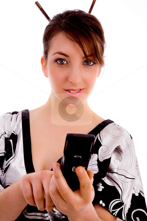 To use this stock image in your creative project, please select the size you need over to the right and click the "Add to Cart" button.
Your downloaded image will come with the Cutcaster watermark removed so don’t worry about the watermark you see on this page. Front view of woman in kimono dialing number stock photo, Front view of woman in kimono dialing number on an isolated white background by Imagery Majestic