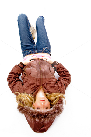 To use this stock image in your creative project, please select the size you need over to the right and click the "Add to Cart" button.
Your downloaded image will come with the Cutcaster watermark removed so don’t worry about the watermark you see on this page. Top view of resting beautiful model looking at camera stock photo, Top view of resting beautiful model looking at camera with white background by Imagery Majestic