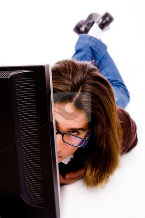 To use this stock image in your creative project, please select the size you need over to the right and click the "Add to Cart" button.
Your downloaded image will come with the Cutcaster watermark removed so don’t worry about the watermark you see on this page. Front view of man working on computer stock photo, Front view of man working on computer on an isolated white background by Imagery Majestic