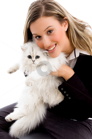 To use this stock image in your creative project, please select the size you need over to the right and click the "Add to Cart" button.
Your downloaded image will come with the Cutcaster watermark removed so don’t worry about the watermark you see on this page. Female smiling and posing with cat stock photo, Female smiling and posing with cat on an isolated white background by Imagery Majestic