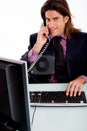 To use this stock image in your creative project, please select the size you need over to the right and click the "Add to Cart" button.
Your downloaded image will come with the Cutcaster watermark removed so don’t worry about the watermark you see on this page. Front view of executive talking on phone stock photo, Front view of executive talking on phone with white background by Imagery Majestic