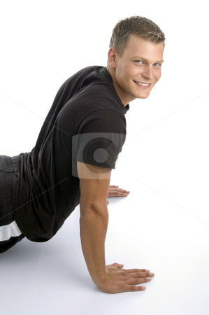 To use this stock image in your creative project, please select the size you need over to the right and click the "Add to Cart" button.
Your downloaded image will come with the Cutcaster watermark removed so don’t worry about the watermark you see on this page. Muscular man doing push ups stock photo, Muscular man doing push ups on an isolated background by Imagery Majestic