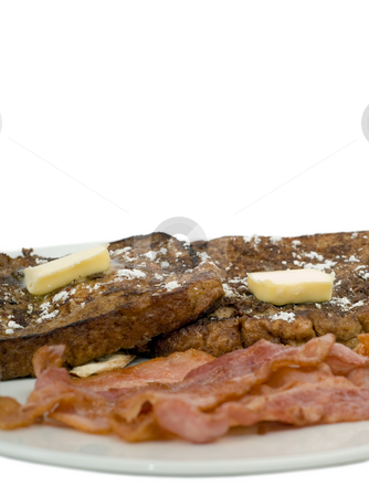 To use this stock image in your creative project, please select the size you need over to the right and click the "Add to Cart" button.
Your downloaded image will come with the Cutcaster watermark removed so don’t worry about the watermark you see on this page. Breakfast Concept stock photo, Closeup view of some French Toast and cooked bacon by Richard Nelson