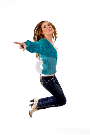 To use this stock image in your creative project, please select the size you need over to the right and click the "Add to Cart" button.
Your downloaded image will come with the Cutcaster watermark removed so don’t worry about the watermark you see on this page. Side view of young female jumping stock photo, Side view of young female jumping with white background by Imagery Majestic
