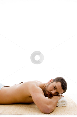 To use this stock image in your creative project, please select the size you need over to the right and click the "Add to Cart" button.
Your downloaded image will come with the Cutcaster watermark removed so don’t worry about the watermark you see on this page. Side view of man lying down on mat at spa stock photo, Side view of man lying down on mat at spa on an isolated background by Imagery Majestic