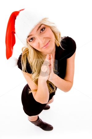 To use this stock image in your creative project, please select the size you need over to the right and click the "Add to Cart" button.
Your downloaded image will come with the Cutcaster watermark removed so don’t worry about the watermark you see on this page. Top view of praying female wearing christmas hat stock photo, Top view of praying female wearing christmas hat on an isolated background by Imagery Majestic