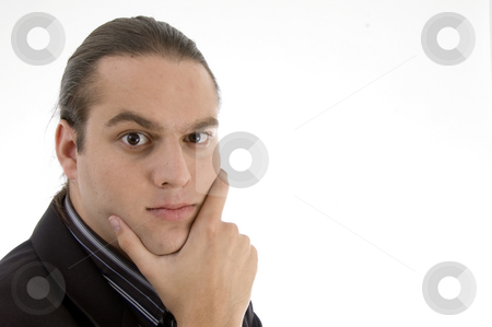 To use this stock image in your creative project, please select the size you need over to the right and click the "Add to Cart" button.
Your downloaded image will come with the Cutcaster watermark removed so don’t worry about the watermark you see on this page. Portrait of angry businessman stock photo, Portrait of angry businessman on an isolated white background by Imagery Majestic