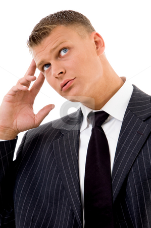 To use this stock image in your creative project, please select the size you need over to the right and click the "Add to Cart" button.
Your downloaded image will come with the Cutcaster watermark removed so don’t worry about the watermark you see on this page. Stressed young employee looking upward stock photo, Stressed young employee looking upward on an isolated white background by Imagery Majestic