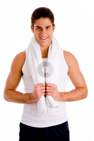 To use this stock image in your creative project, please select the size you need over to the right and click the "Add to Cart" button.
Your downloaded image will come with the Cutcaster watermark removed so don’t worry about the watermark you see on this page. Front view of man holding towel at gym stock photo, Ront view of man holding towel on an isolated background by Imagery Majestic