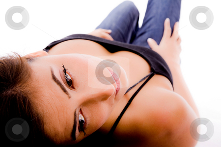 To use this stock image in your creative project, please select the size you need over to the right and click the "Add to Cart" button.
Your downloaded image will come with the Cutcaster watermark removed so don’t worry about the watermark you see on this page. Front view of laying young female stock photo, Front view of laying young female with white background by Imagery Majestic