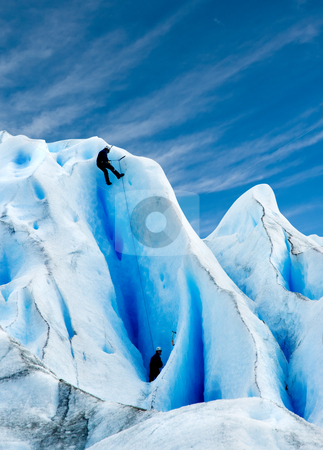 To use this stock image in your creative project, please select the size you need over to the right and click the "Add to Cart" button.
Your downloaded image will come with the Cutcaster watermark removed so don’t worry about the watermark you see on this page. Climbing a glacier in patagonia. stock photo, Two men climbing a glacier in patagonia. by Pablo Caridad
