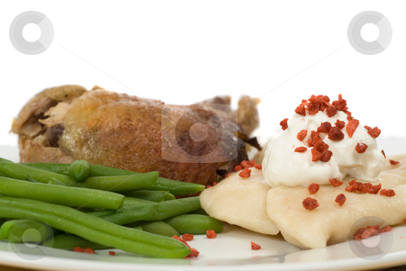 To use this stock image in your creative project, please select the size you need over to the right and click the "Add to Cart" button.
Your downloaded image will come with the Cutcaster watermark removed so don’t worry about the watermark you see on this page. Food stock photo, Closeup of some chicken, perogies, and green beans, isolated against a white background by Richard Nelson